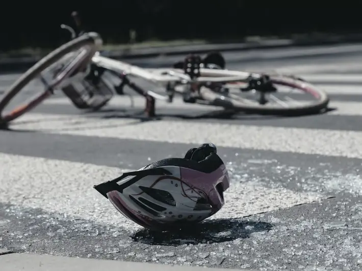 Ahwatukee illegal left turn accident attorney reviewing crash evidence near Ahwatukee Foothills Towne Center