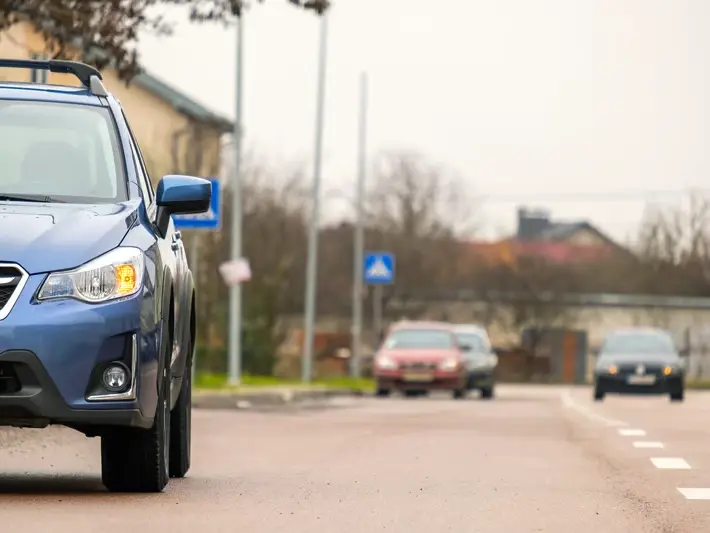 Legal case review for Arizona left-turn accident claim involving school traffic near Higley Unified School District routes