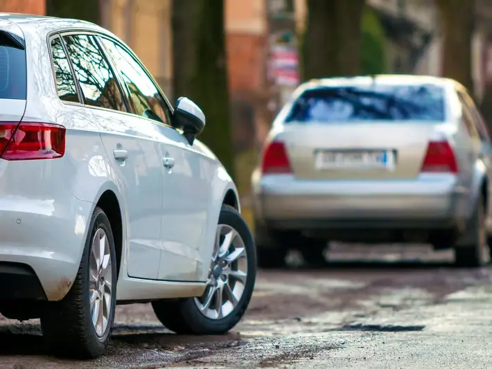 Insurance negotiation help for illegal left turn wreck near San Tan Village Shopping Center for San Tan Valley driver